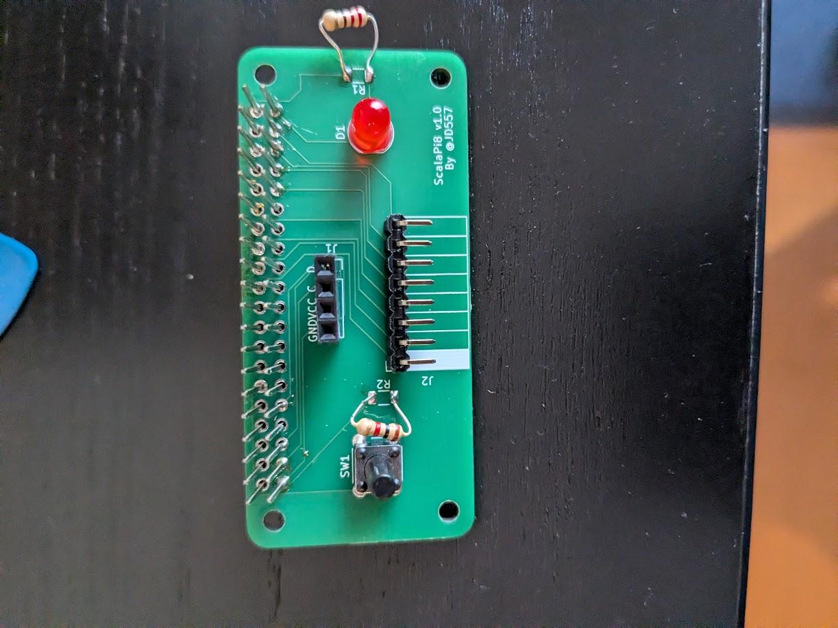 Final soldered board. It's visible how small the keyboard pins are and how the resistors were hacked in.
